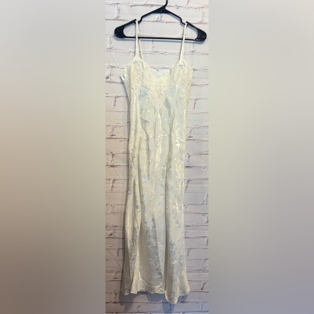 Vintage Victoria’s Secret Cream Satin Slip Gown
Size Medium